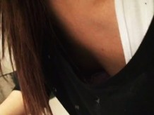 Asian beauty shows her cleavage in this downblouse voyeur video