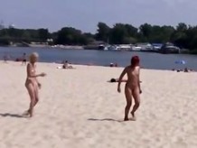 This teen nudist strips bare at a public beach