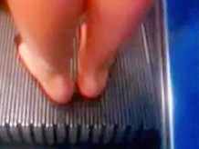 Feet on an escalator - Rolltreppenfuesse