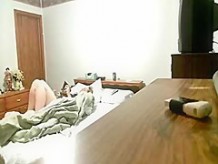 My mum masturbates on bed. Hidden cam
