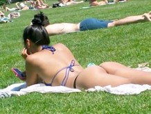 Asian sunbathing in thong