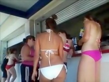 Gorgeous maids having a drink in their bikinis