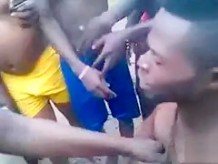African girl lost a bet as a big group watches