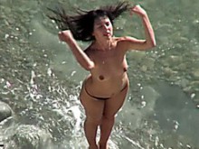 videos de playa en topless