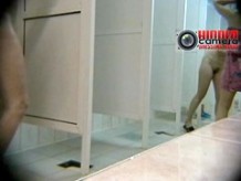Perfect asses in the shower caught on a voyeur spy cam