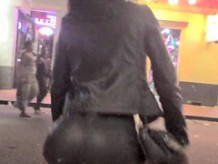 Candid Ebony ass in leather shorts