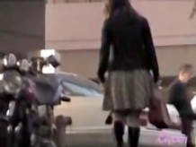 Asian has her skirt lifted high during street sharking.