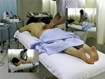 Busty Japanese enjoys a very hot massage on hidden camera