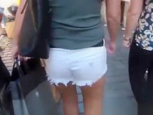 Girl in white shorts.