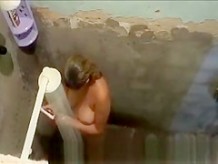 Woman caught in old shower