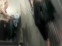 Blonde girl caught trying clothes