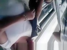 Redhead touches hard cock in bus