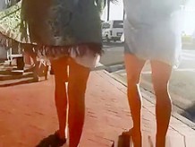 Wind lifts girls dresses exposing their nice asses