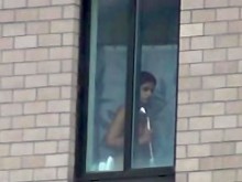 Voyeur: espía en la ducha de la ventana